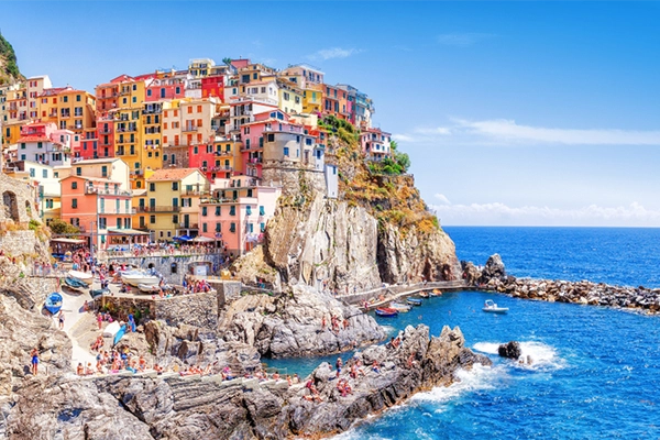 
Manarola, Italy - iconic landmark village in Cinque Terre national park in Italy, Ligury, nearby Spezia city. UNESCO world heritage site. Manarola is famous and popular travel destination.
