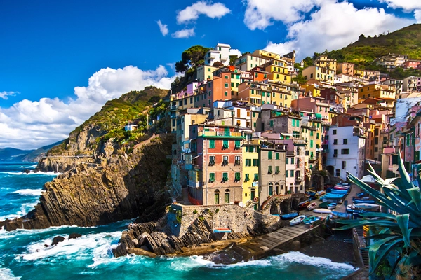 Panorama view of Manarola village one of Cinque Terre at night in La Spezia, Italy.