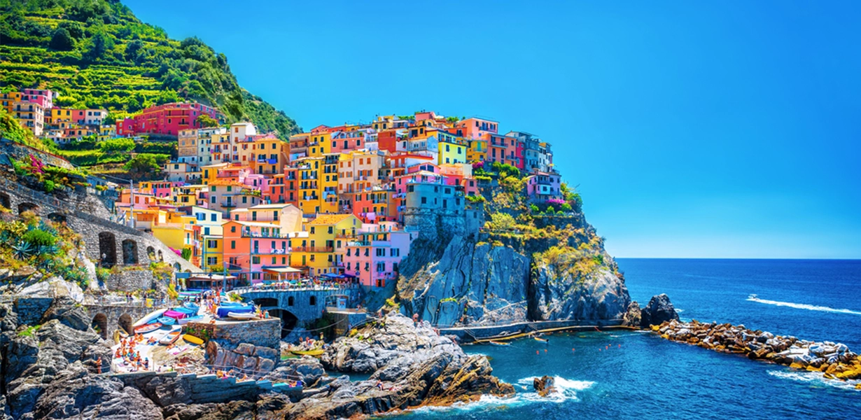 Beautiful colorful cityscape on the mountains over Mediterranean sea, Europe, Cinque Terre, traditional Italian architecture