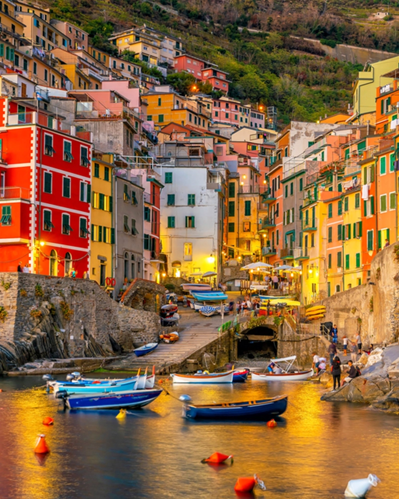 Riomaggiore, Colorful cityscape on the mountains over Mediterranean sea in Cinque Terre Italy Europe