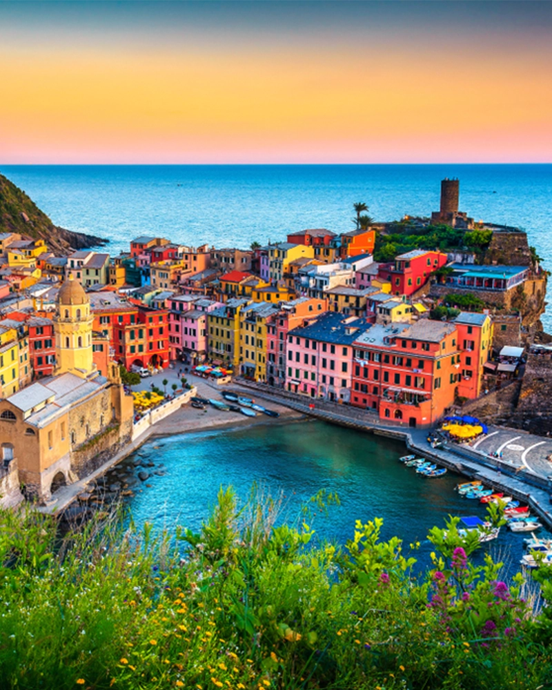 Majestic touristic village on the hill with colorful mediterranean buildings. Fantastic travel and photography place at sunset, Vernazza, Cinque Terre National Park, Liguria, Italy, Europe