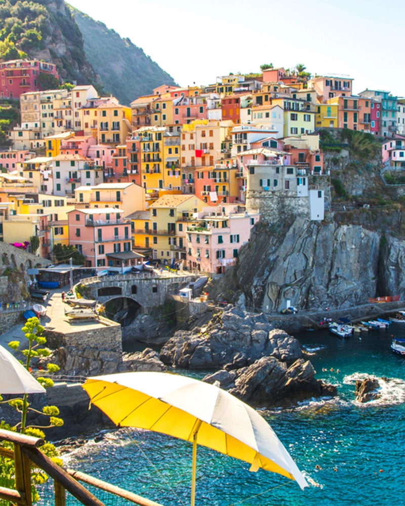 Scenic view of colorful village Vernazza and ocean coast in Cinque Terre, Italy